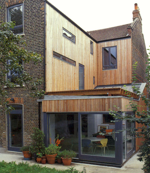Larch clad breathing wall system with Danish timber windows.
