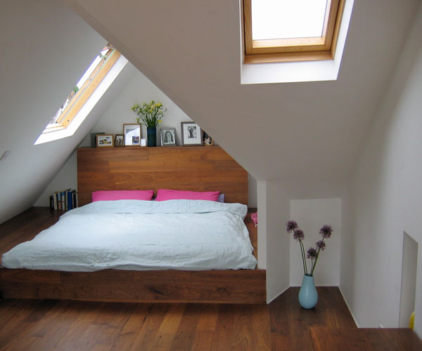 Elm bed built into an existing angled dormer.
