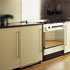 Oak floors, granite worktops, stainless steel splashbacks and handmade lacquered cabinets.
